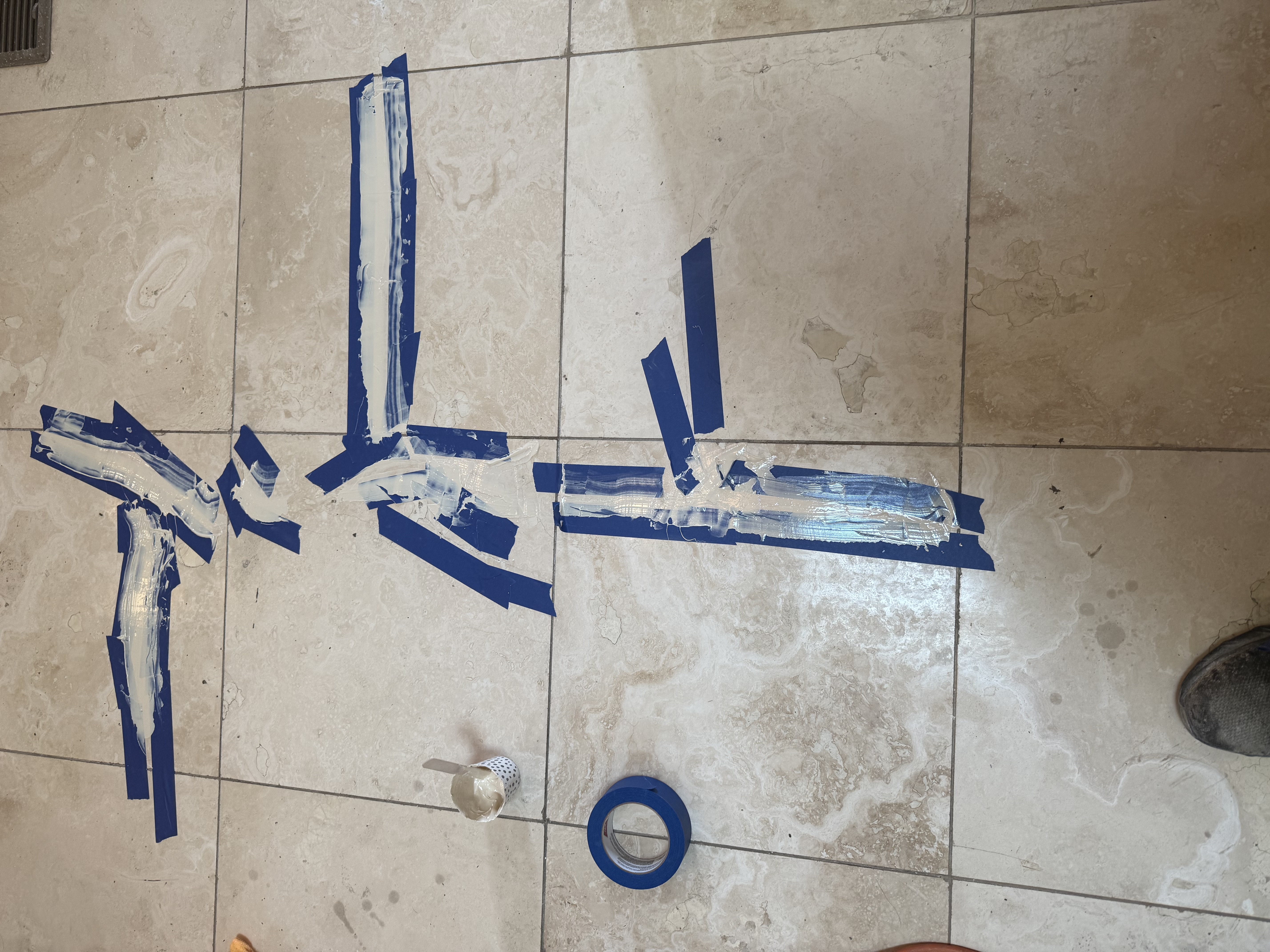 Before — Travertine floor crack repair in Chicago