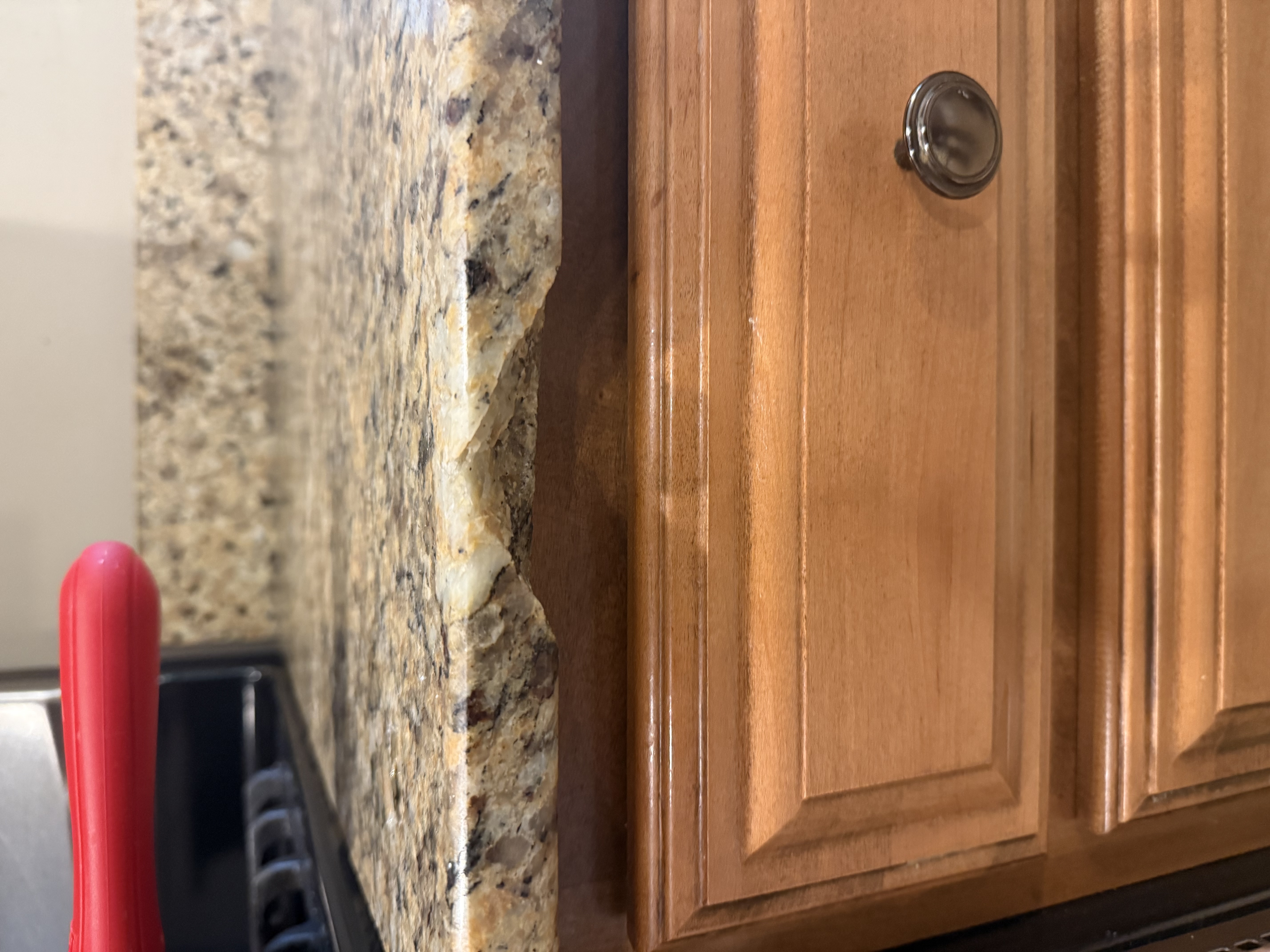 Before — Broken Granite Countertop Repair in Whiting